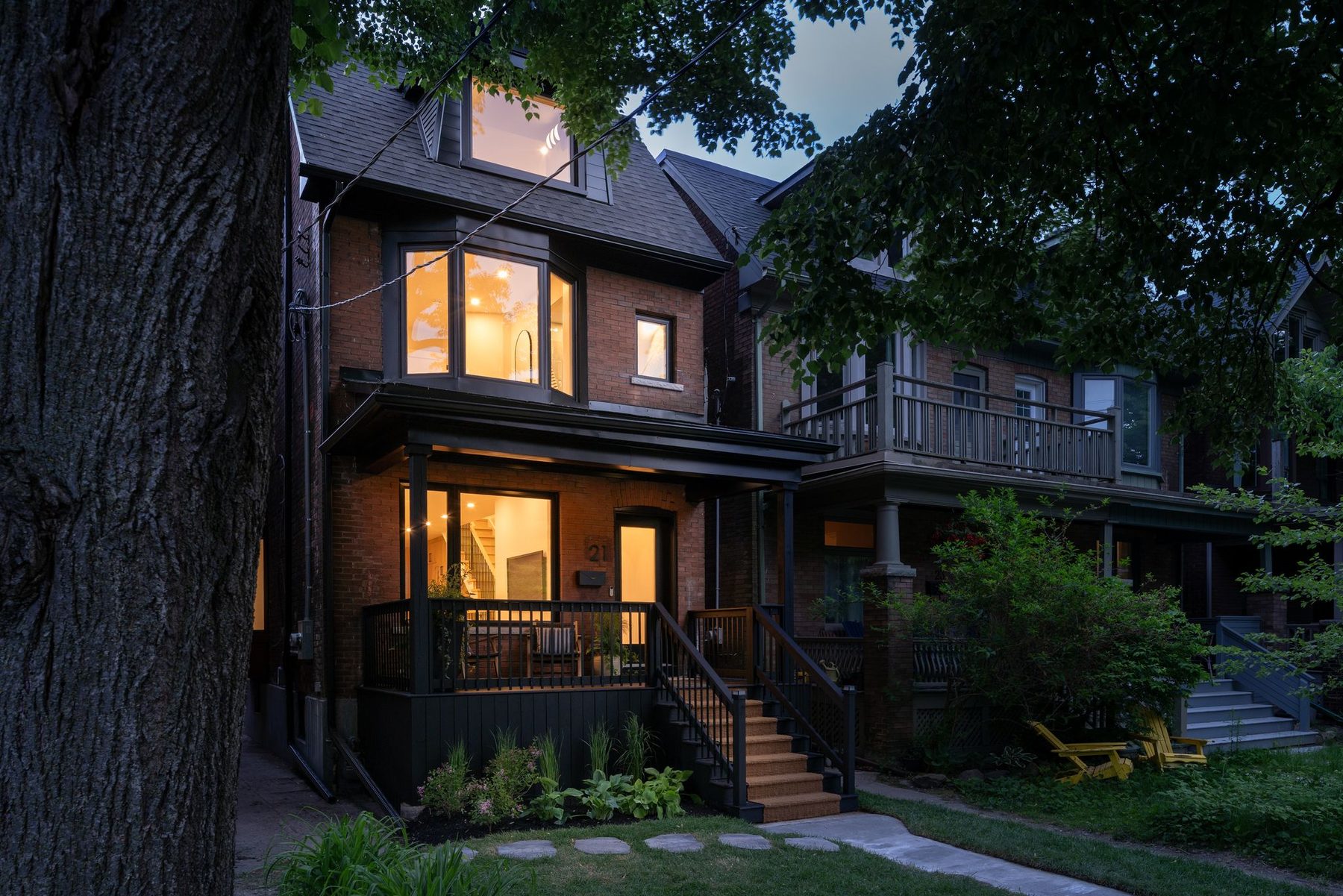 Completed Galley Avenue renovation and rear addition at dusk